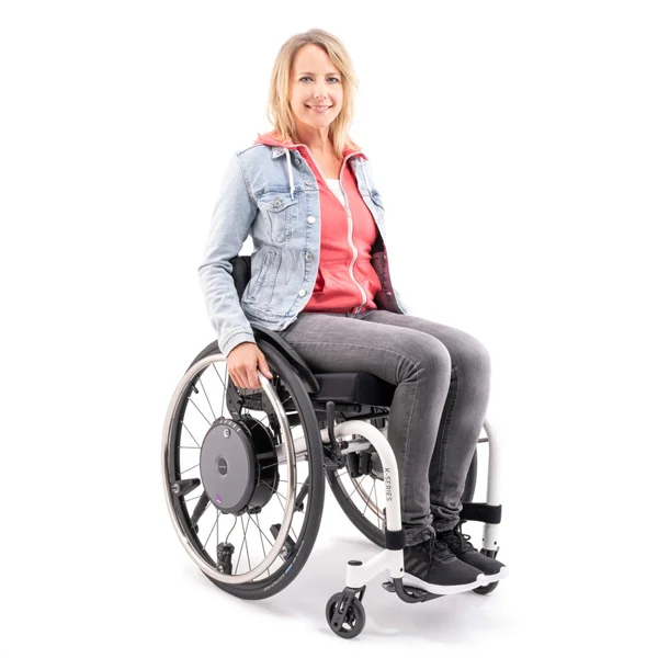 Alber e-motion powered push-rim wheels fitted to a manual wheelchair in a supplier photograph